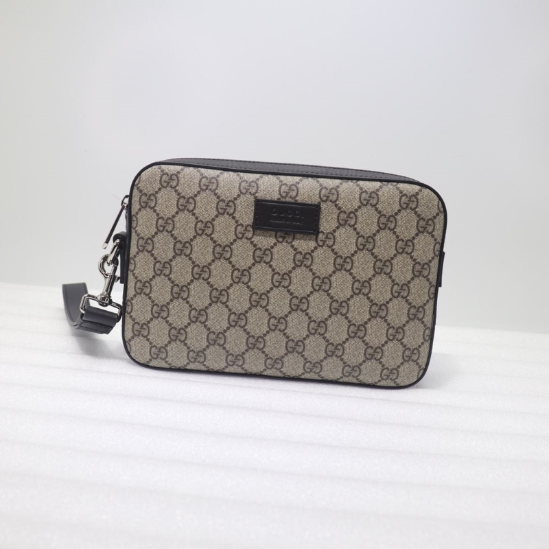G*u*i clutch bags